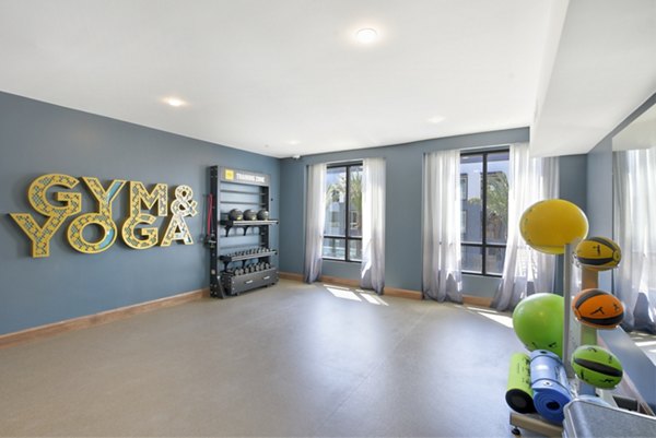 Fitness center with modern equipment at Persea Apartments fitness center