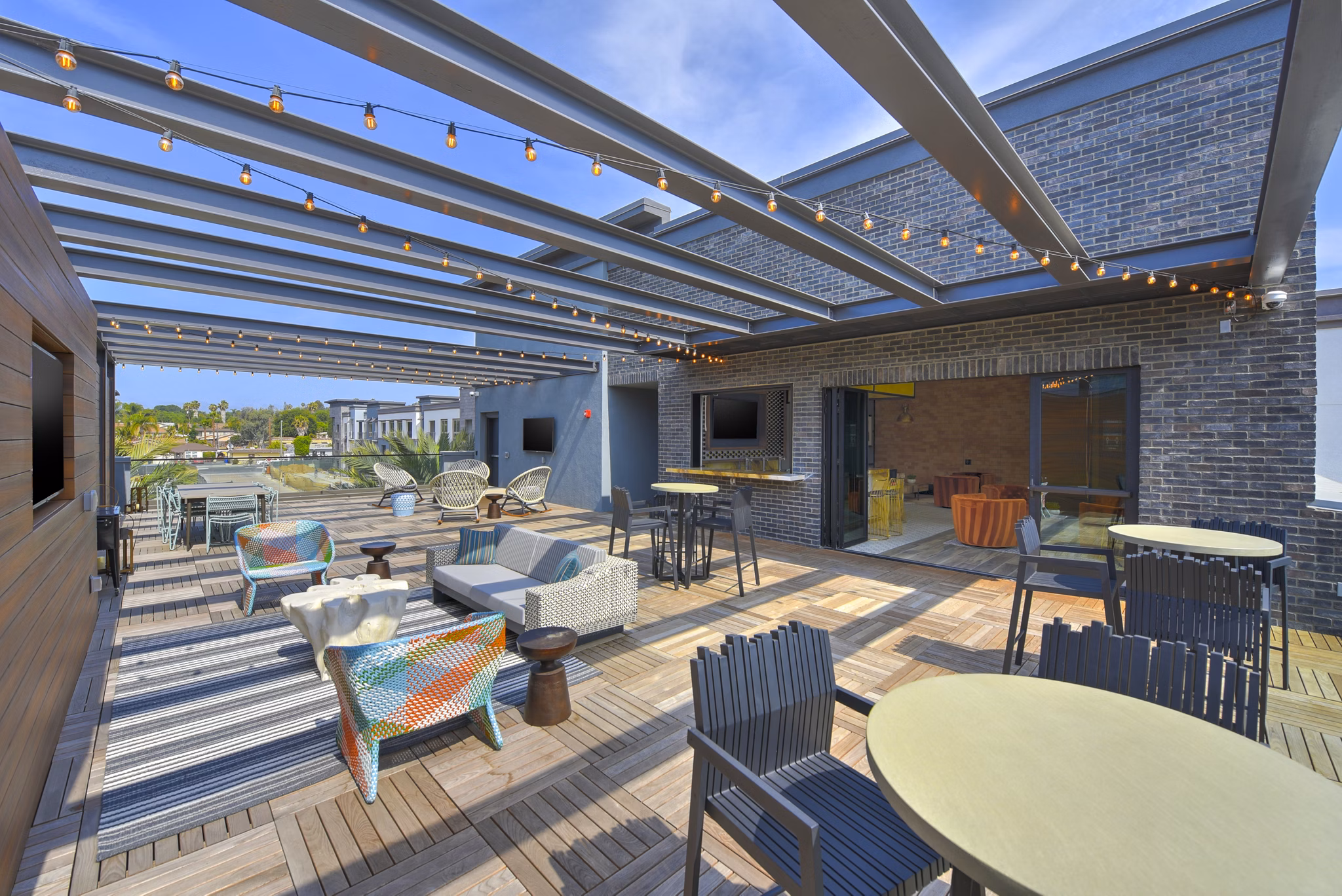 Persea Apartments: Modern rooftop deck offering city views