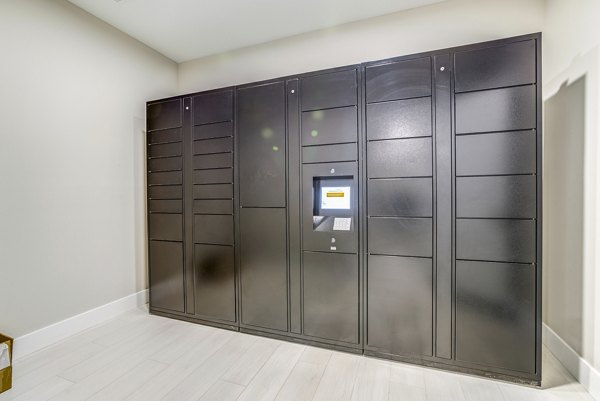 Secure parcel package pickup locker at The Pointe at Siena Ridge Apartments