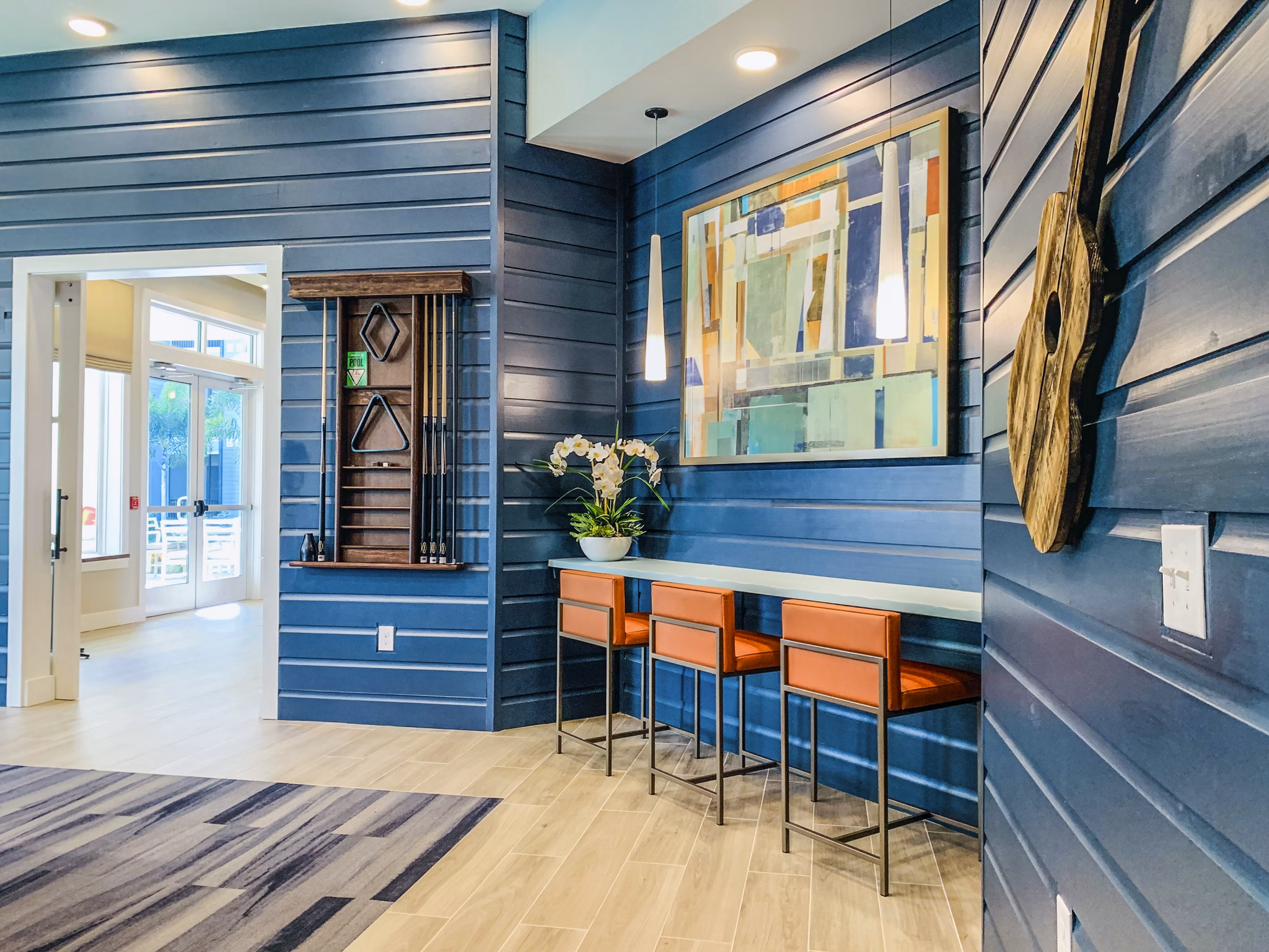 The Pointe at Siena Ridge: Elegant clubhouse lobby with modern furnishings and ample natural light, luxury apartment living