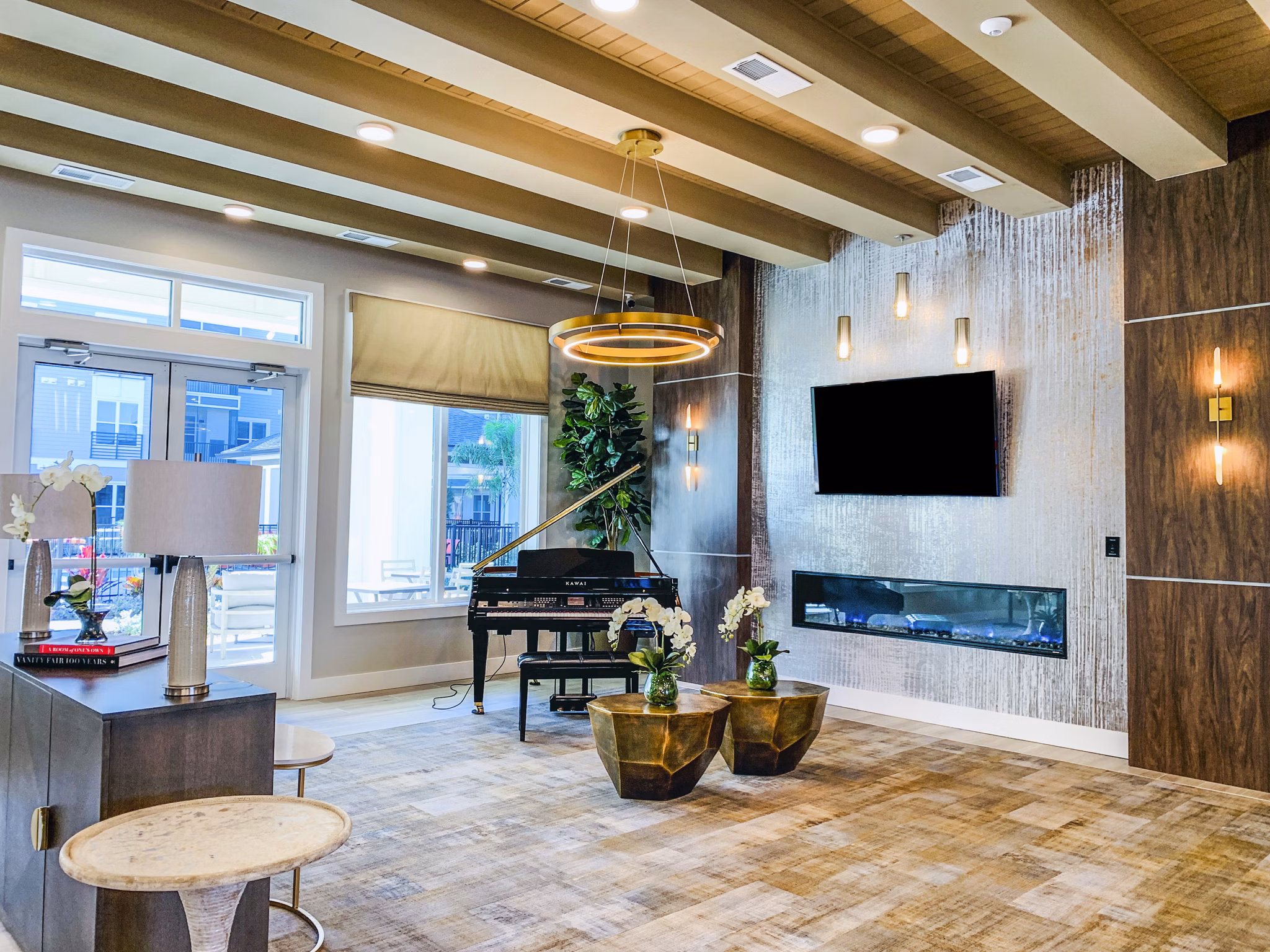 The Pointe at Siena Ridge Apartments: Elegant clubhouse lobby with modern decor and plush seating
