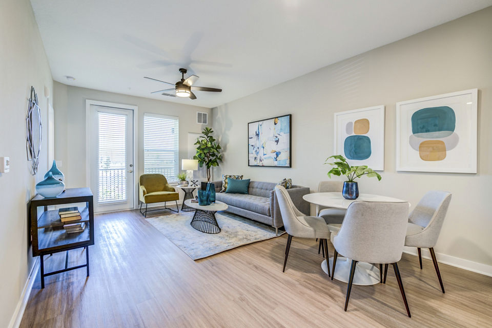 Dining room featuring elegant furnishings at The Pointe at Siena Ridge Apartments