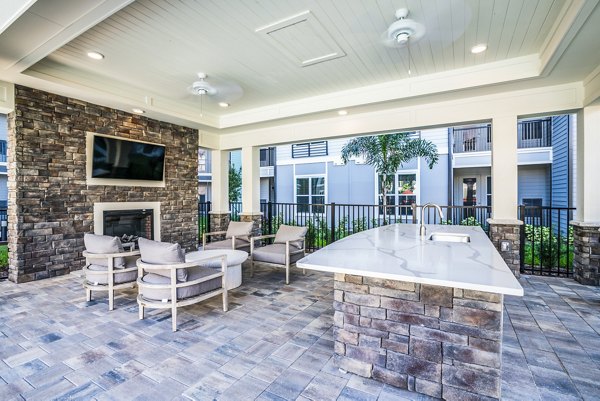 fire pit/patio at The Pointe at Siena Ridge Apartments