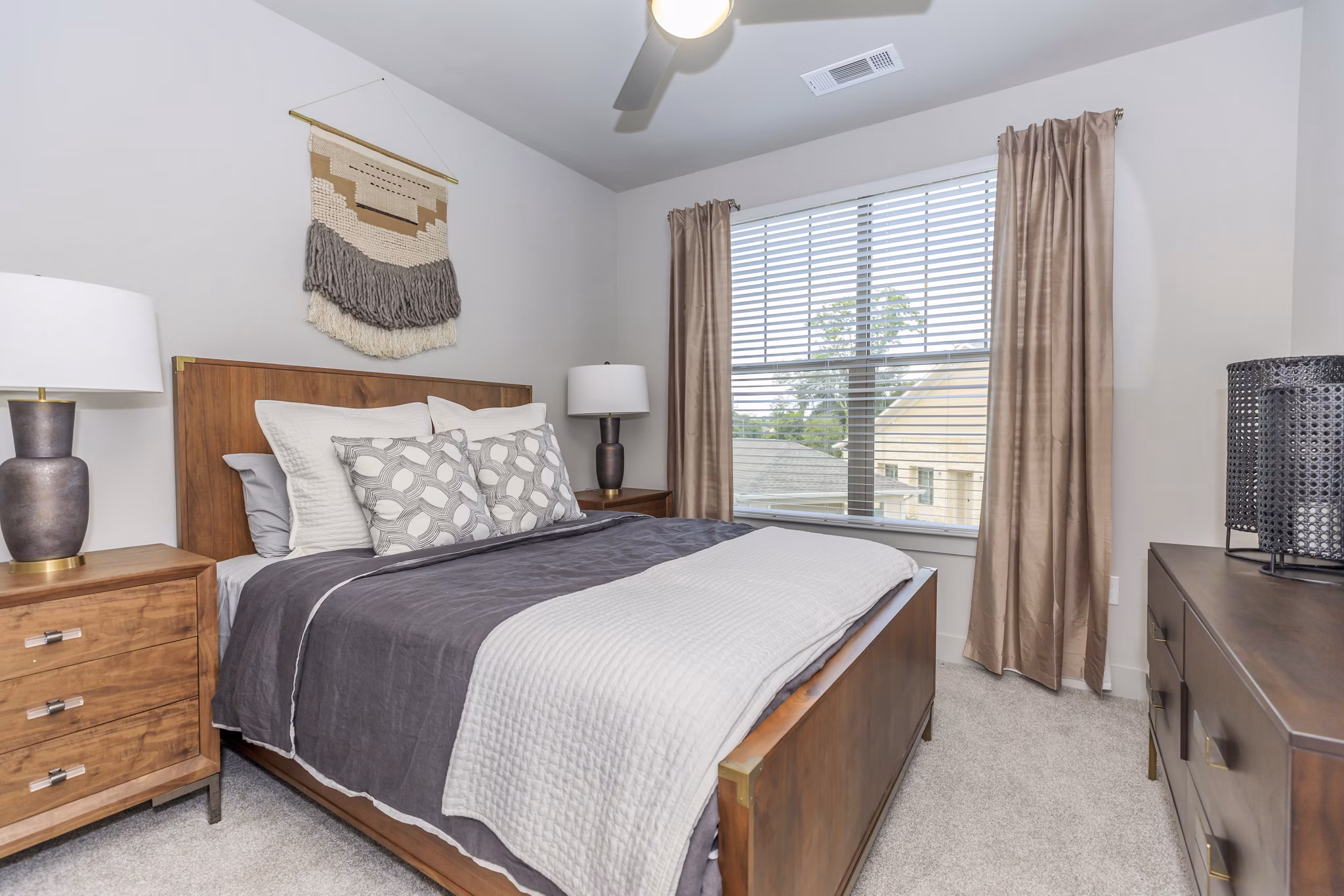 Cozy bedroom with modern decor at Reserve at Lake Jackson Apartments