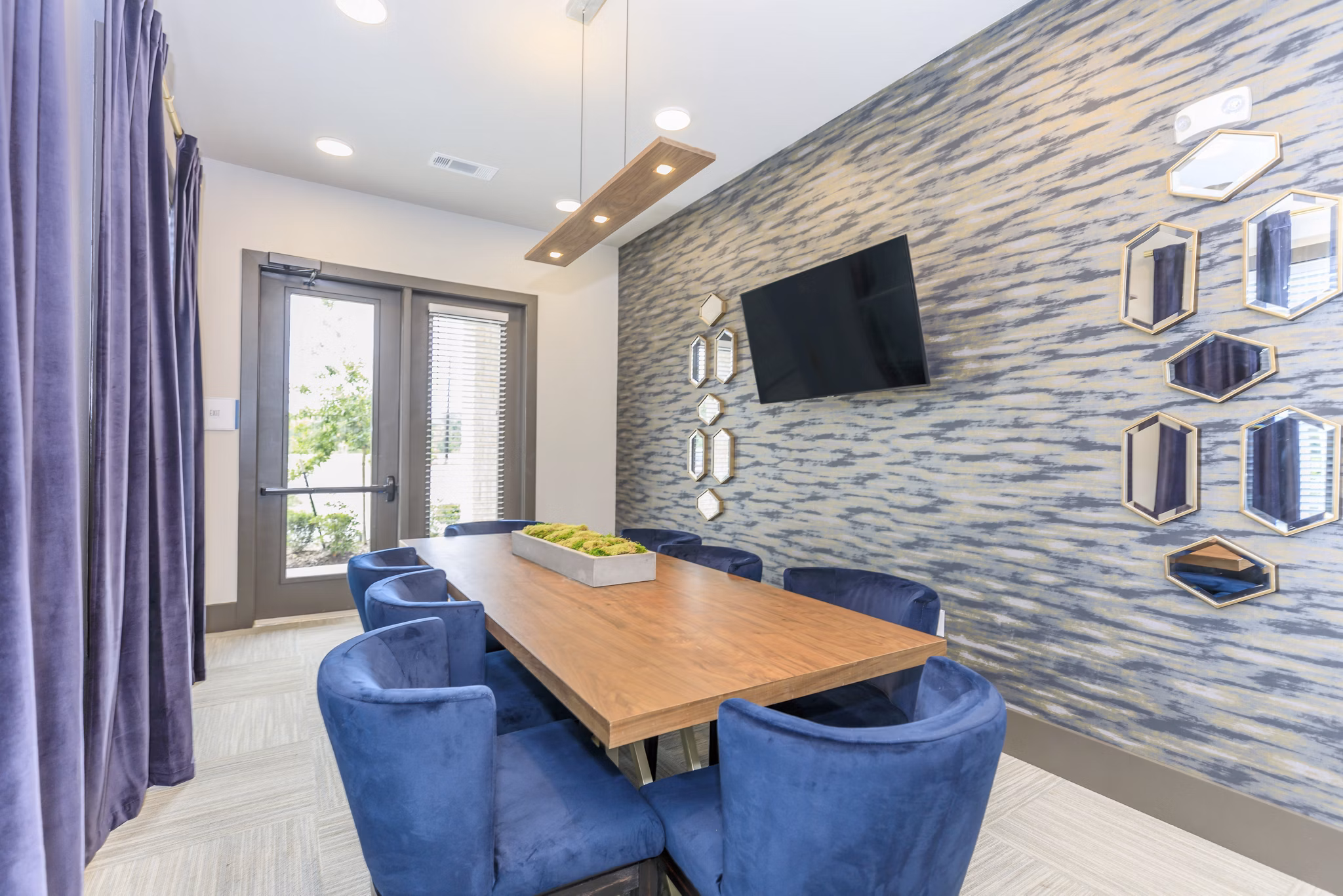 Modern meeting facility with conference seating at Reserve at Lake Jackson Apartments, ideal for business gatherings