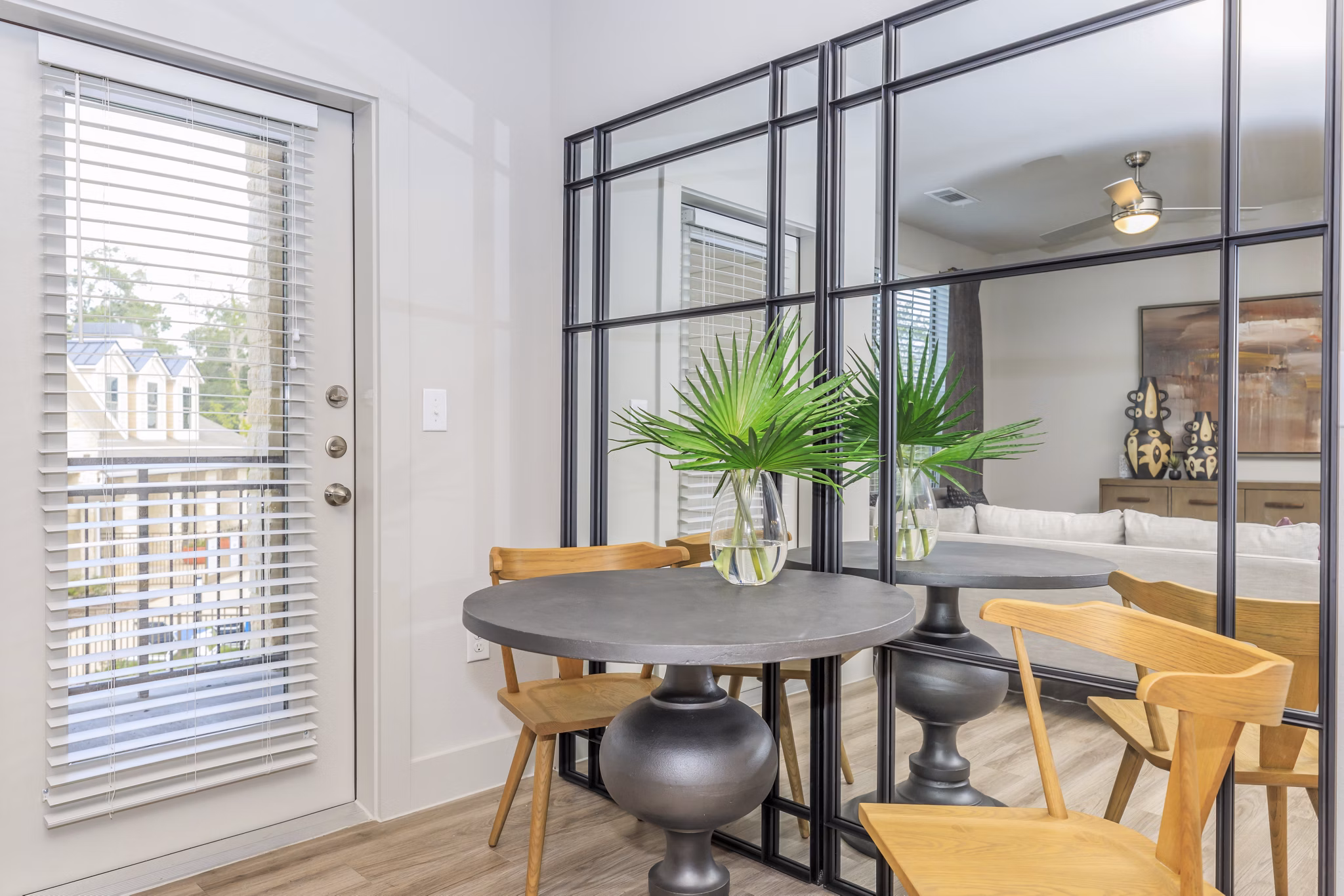 Dining area with modern decor and ample seating at Reserve at Lake Jackson Apartments