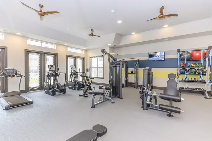 State-of-the-art fitness center featuring modern equipment at Reserve at Lake Jackson Apartments