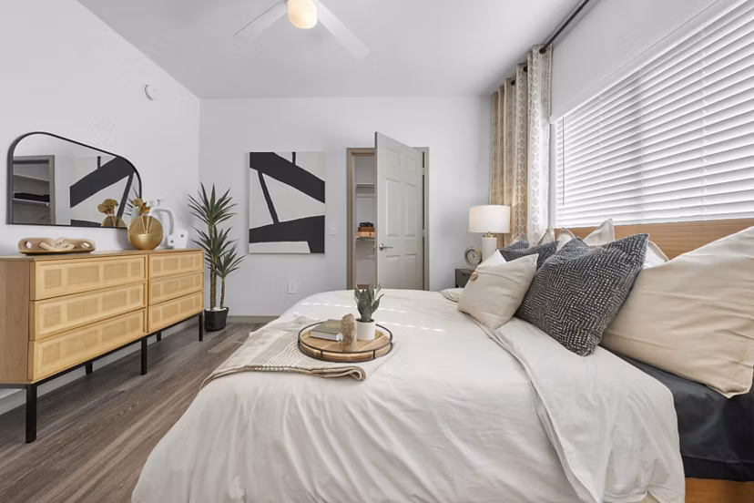 Cozy bedroom with modern decor in Cardinal 95 Apartments offering comfort and style