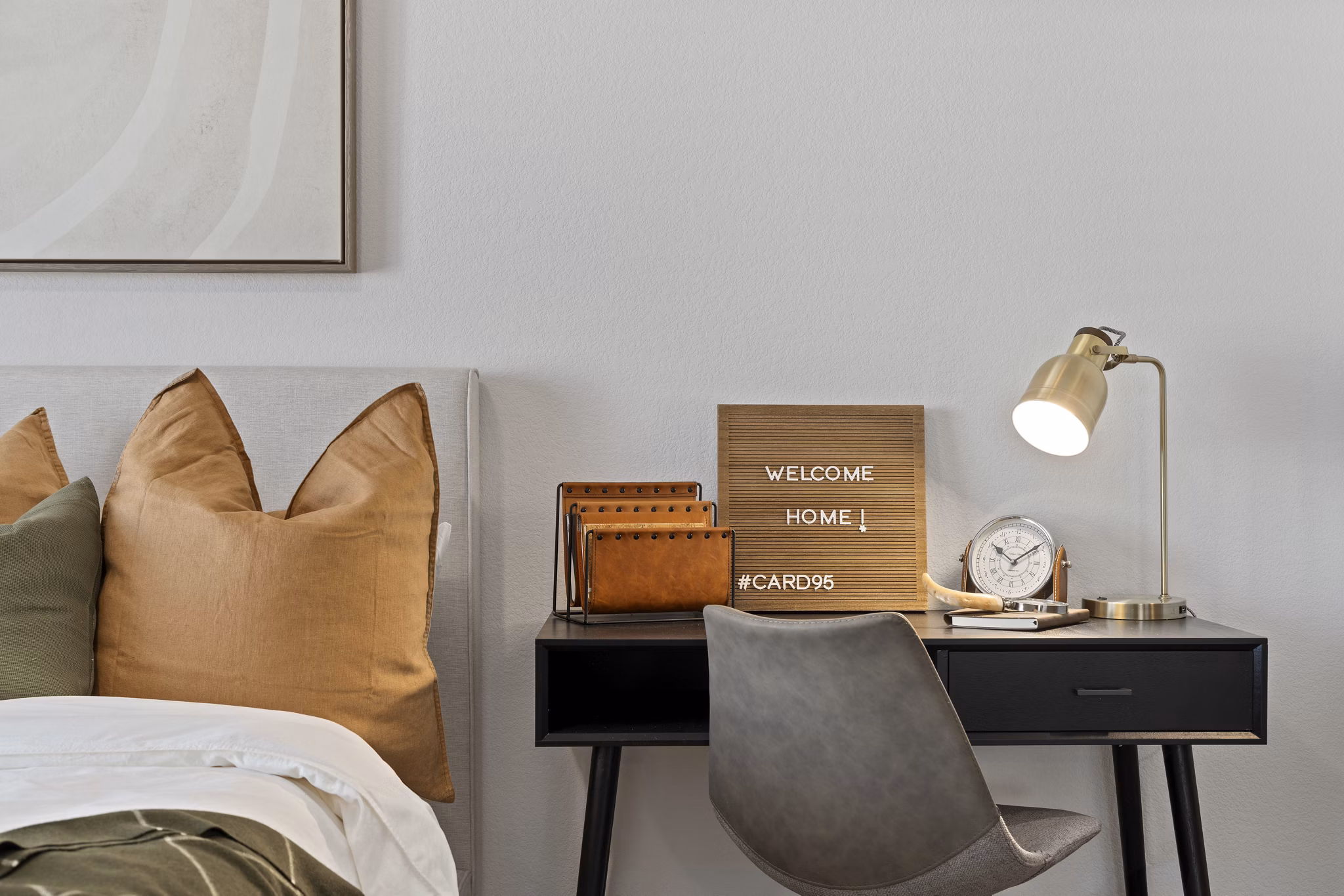 Cozy bedroom with modern decor at Cardinal 95 Apartments
