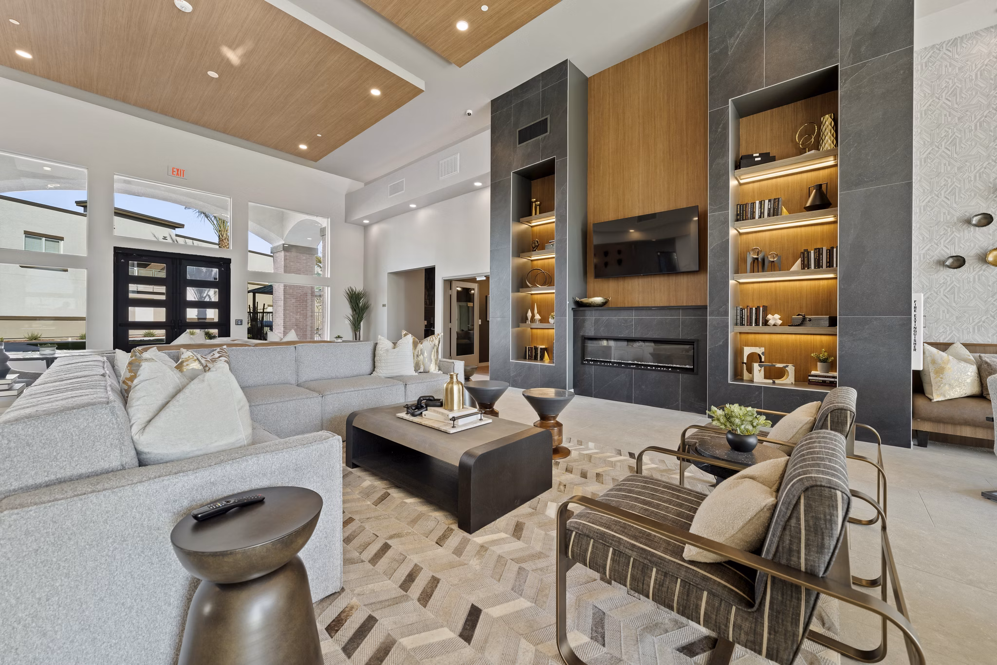 Modern clubhouse with spacious seating at Cardinal 95 Apartments, a Greystar luxury community