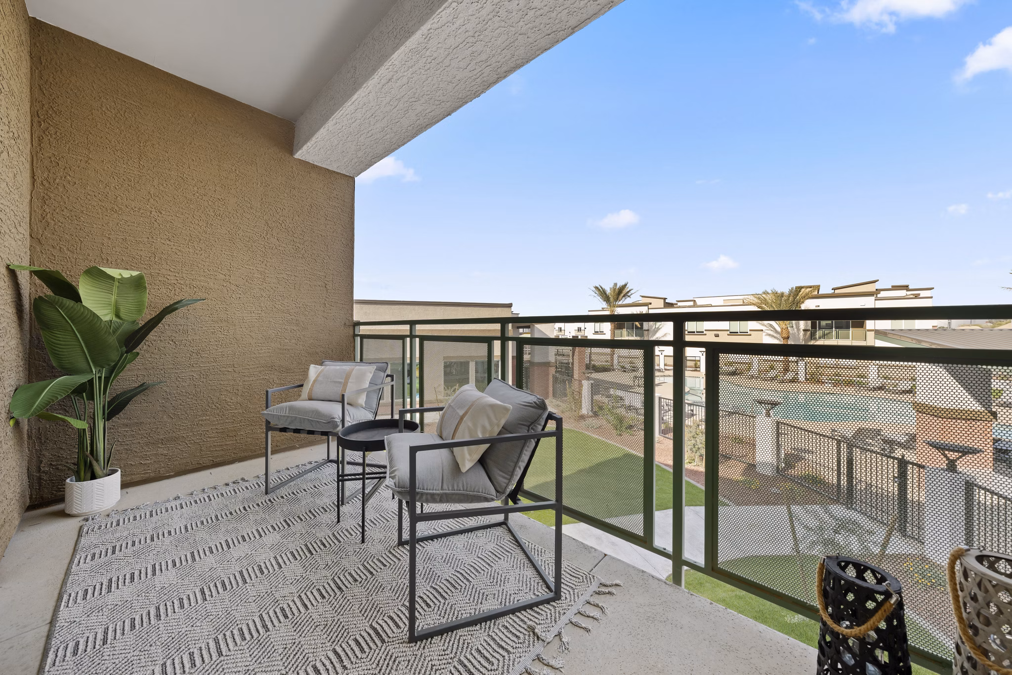 Patio area with modern seating at Cardinal 95 Apartments, featuring luxury amenities in a premium urban setting