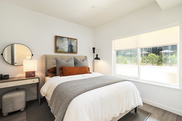 Cozy bedroom with modern decor at The Hayden Apartments