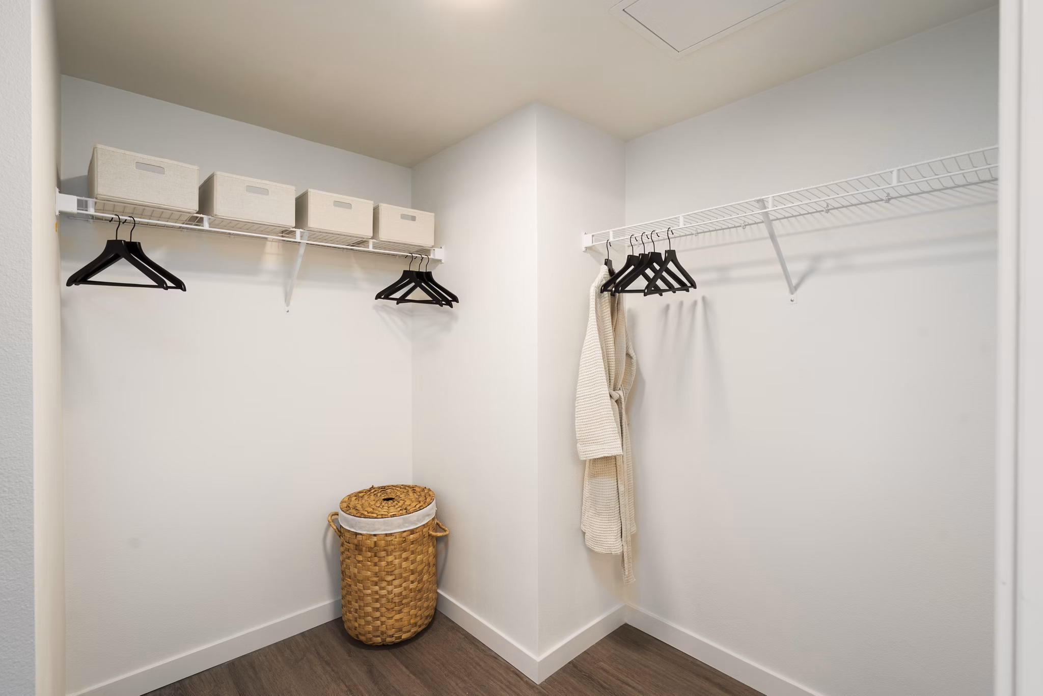 Walk-in closet with ample shelving at The Hayden Apartments