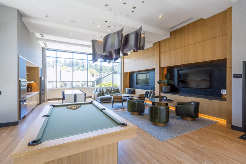 Clubhouse lounge with modern decor at The Hayden Apartments, offering luxury apartments for a vibrant lifestyle