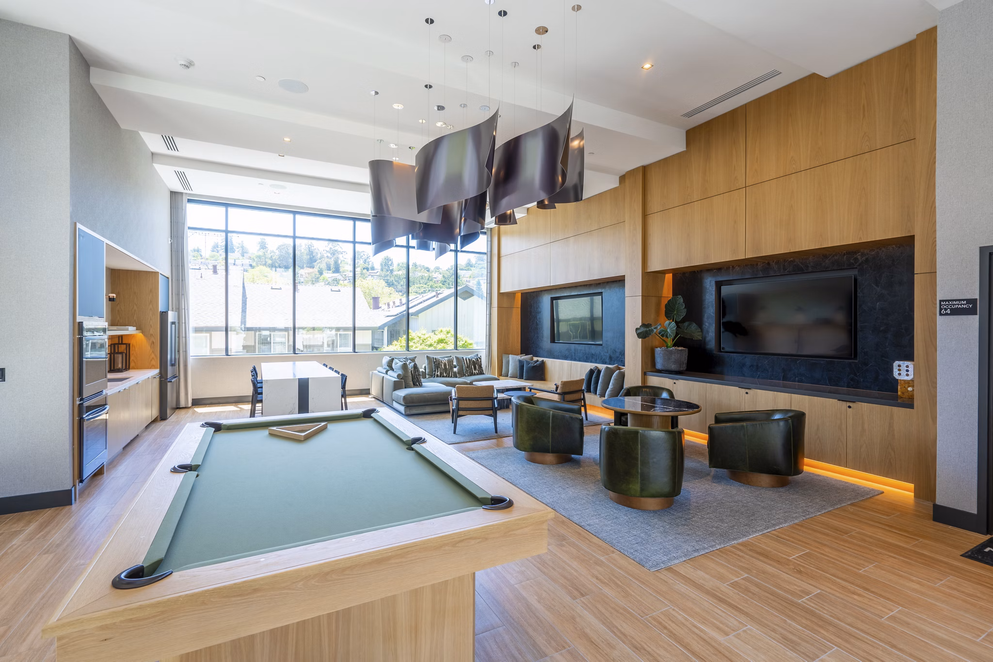 Clubhouse lounge with modern decor at The Hayden Apartments, offering luxury apartments for a vibrant lifestyle