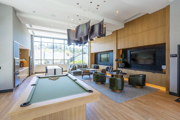 Clubhouse lounge with modern decor at The Hayden Apartments, offering luxury apartments for a vibrant lifestyle