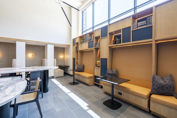 The Hayden Apartments: Elegant clubhouse with modern furnishings and high ceilings