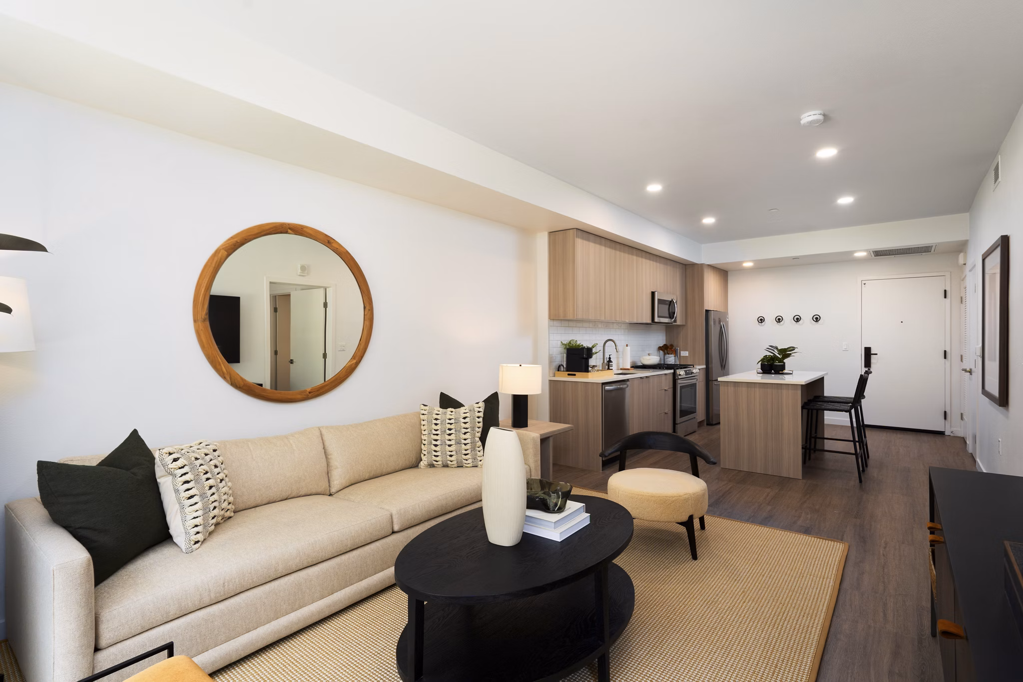 Bright and airy living room with modern furnishings at The Hayden Apartments