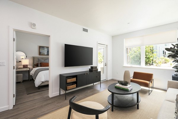 Modern living room with sleek furnishings at The Hayden Apartments