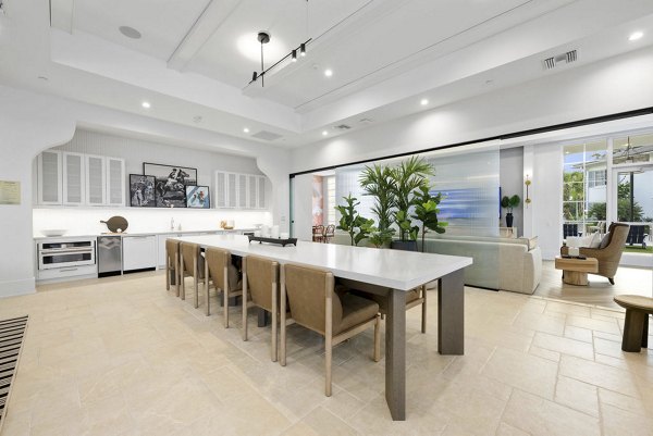 Elan Polo Gardens: Stylish clubhouse with modern design and comfortable seating in luxury Elan Polo Gardens apartments