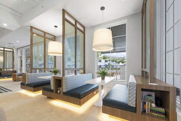 Clubhouse with modern design and elegant seating at Elan Polo Gardens Apartments
