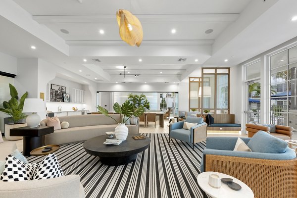 Clubhouse featuring luxurious seating and modern decor at Elan Polo Gardens Apartments