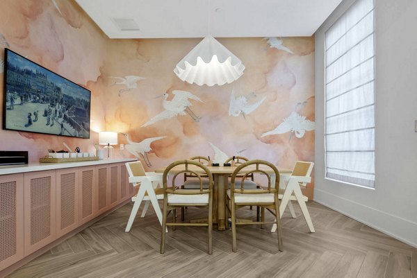 Clubhouse featuring modern design and comfortable seating at Elan Polo Gardens Apartments