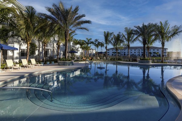 Resort-style pool at Elan Polo Gardens Apartments offering luxury relaxation and outdoor leisure amenities in a serene environment