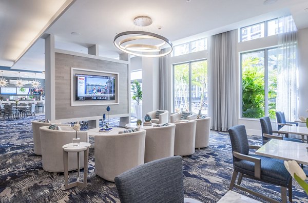 Clubhouse lobby featuring modern decor and seating at Overture Doral Apartments, a luxury Greystar property in Miami