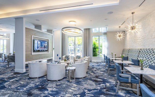 Luxe clubhouse lobby featuring elegant seating at Overture Doral Apartments