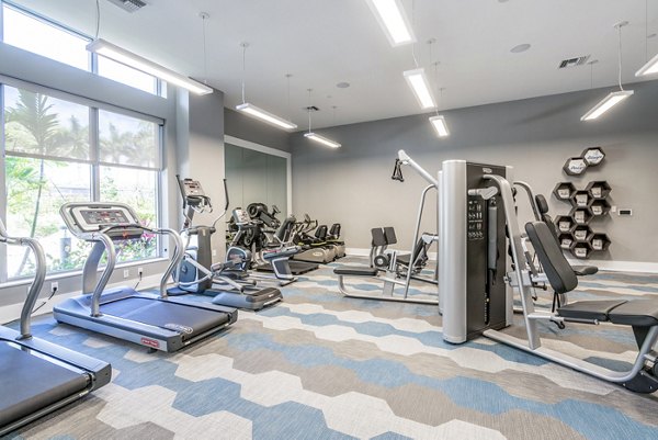 Modern fitness center with state-of-the-art equipment at Overture Doral Apartments