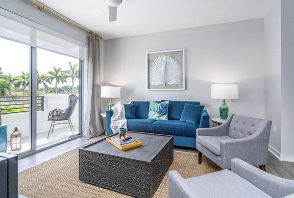 Stylish living room with modern furnishings at Overture Doral Apartments, a luxurious Greystar property in vibrant Doral, Florida