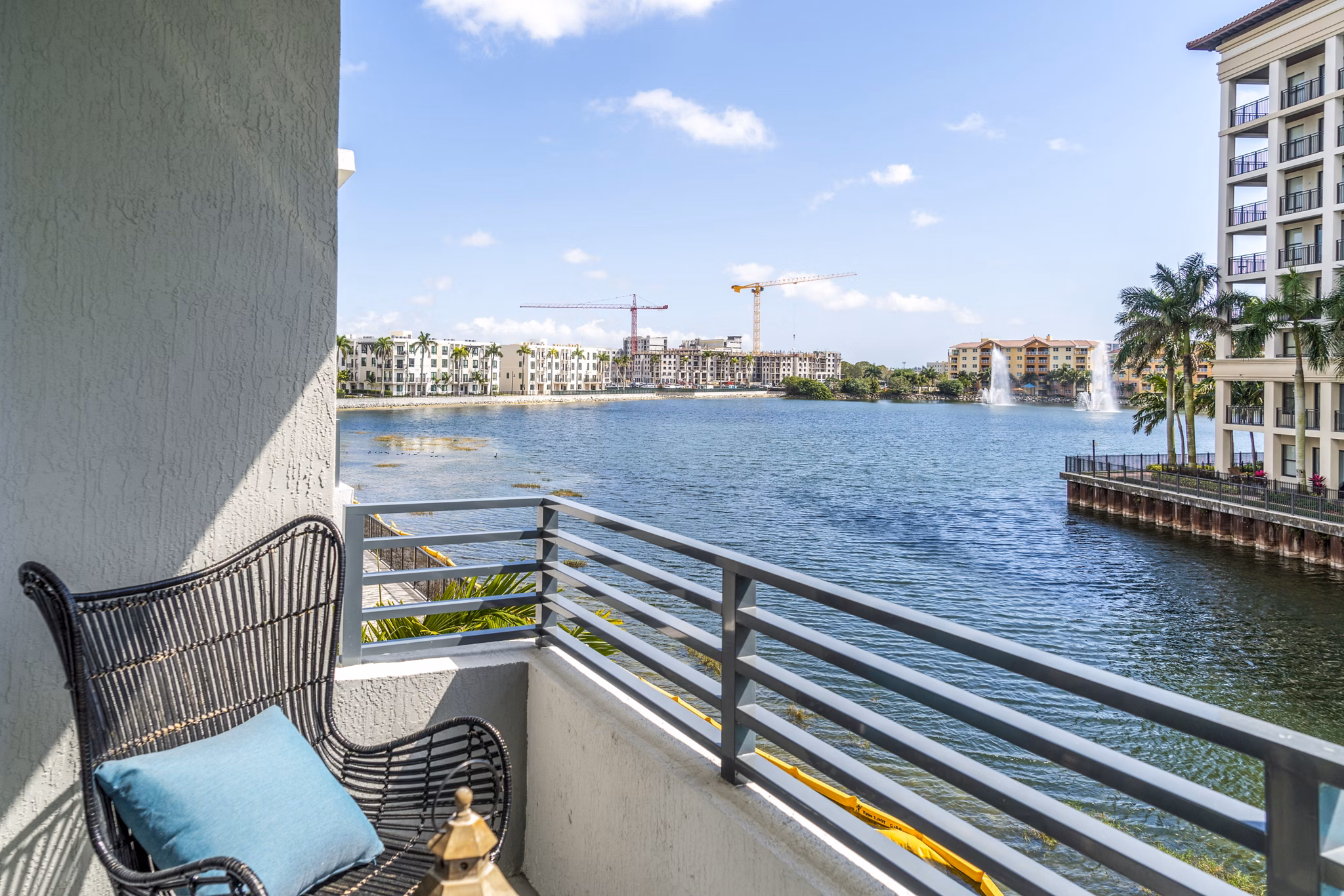 Scenic patio with modern seating at Overture Doral Apartments, ideal for relaxation and outdoor dining