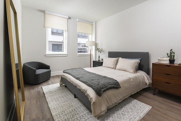 Modern bedroom with sleek design and natural light at Hagert and York Apartments
