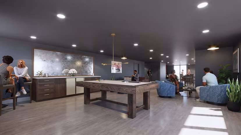 Modern clubhouse with lounge seating and fireplace at Hagert and York Apartments