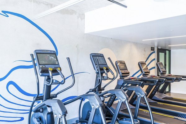 Modern fitness center with state-of-the-art equipment at Ventana Residences Apartments