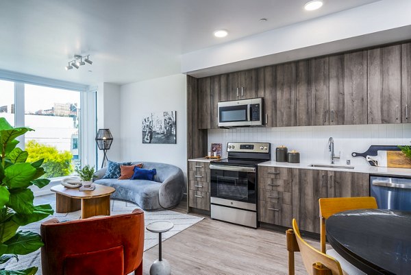 Modern kitchen with stainless steel appliances at Ventana Residences Apartments