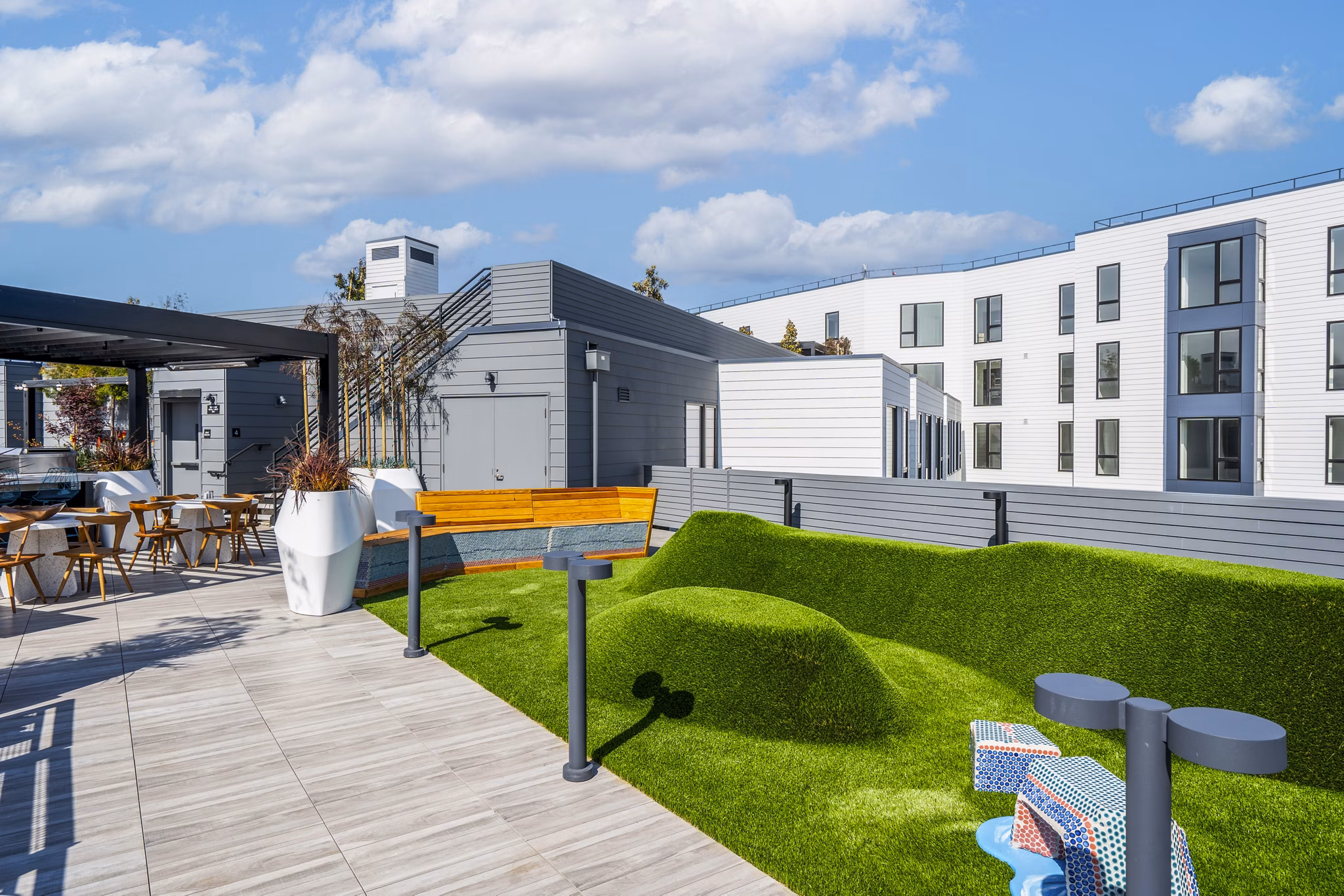 Spacious dog park at Ventana Residences Apartments offering ample play area and greenery for pets and residents