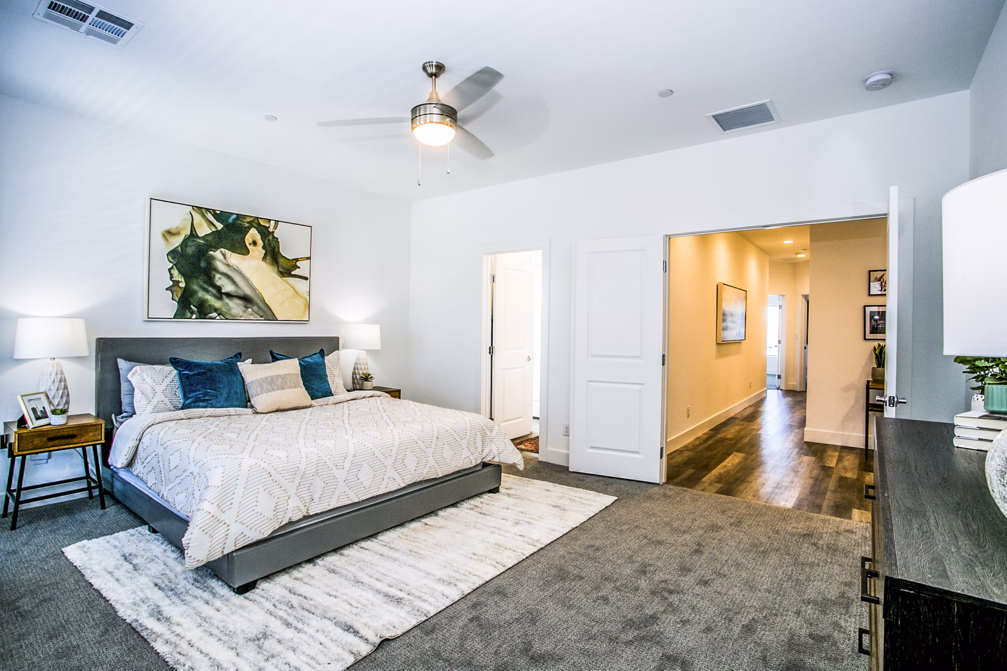 Modern bedroom with elegant decor at Townes at Peace Way Apartments