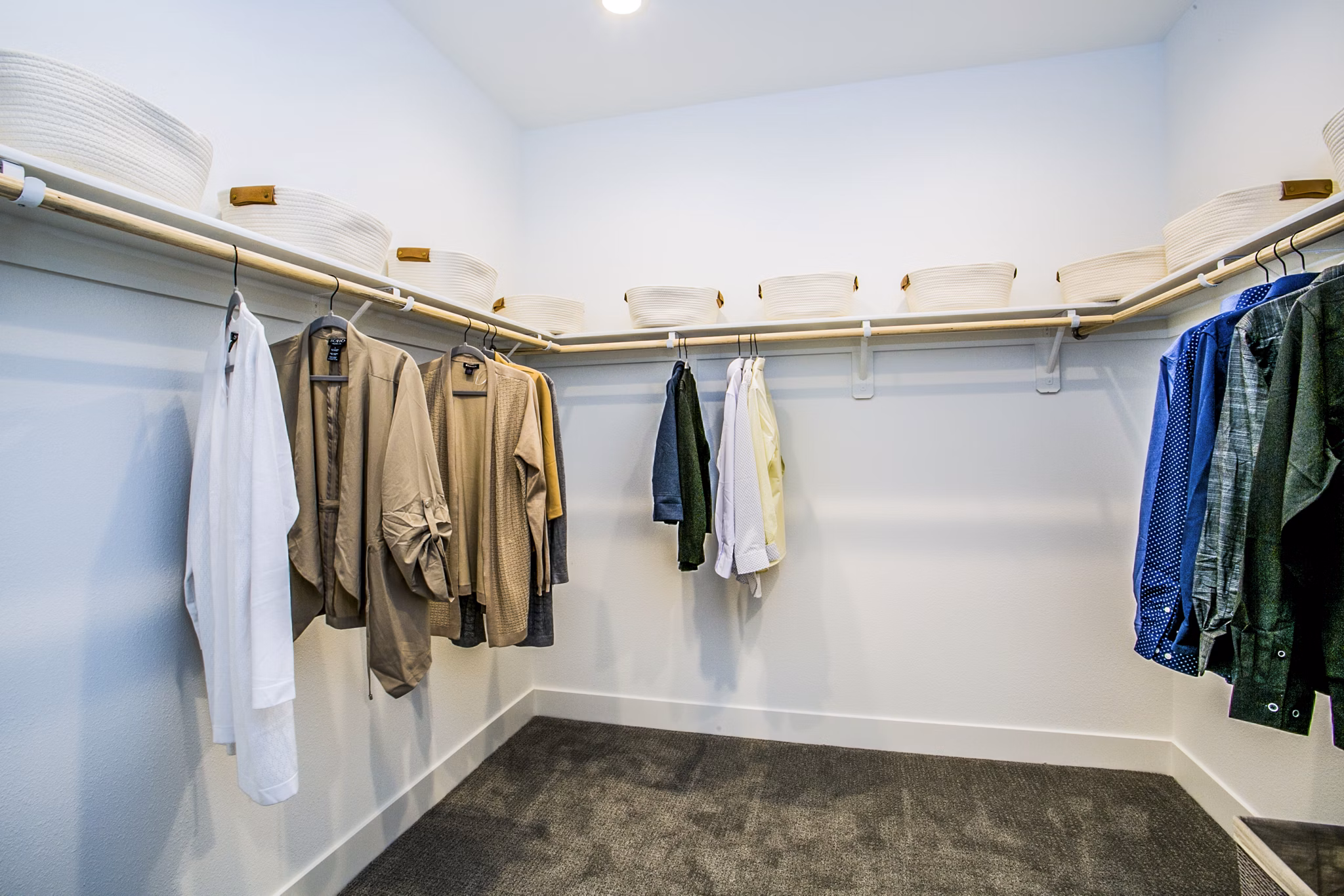 Spacious bedroom closet with custom shelving at Townes at Peace Way Apartments