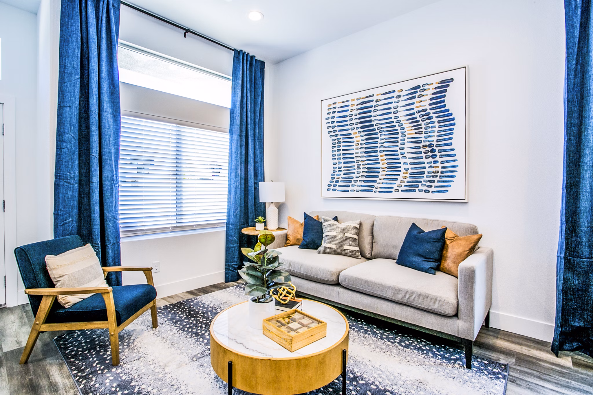 Spacious living room with modern decor in Townes at Peace Way Apartments