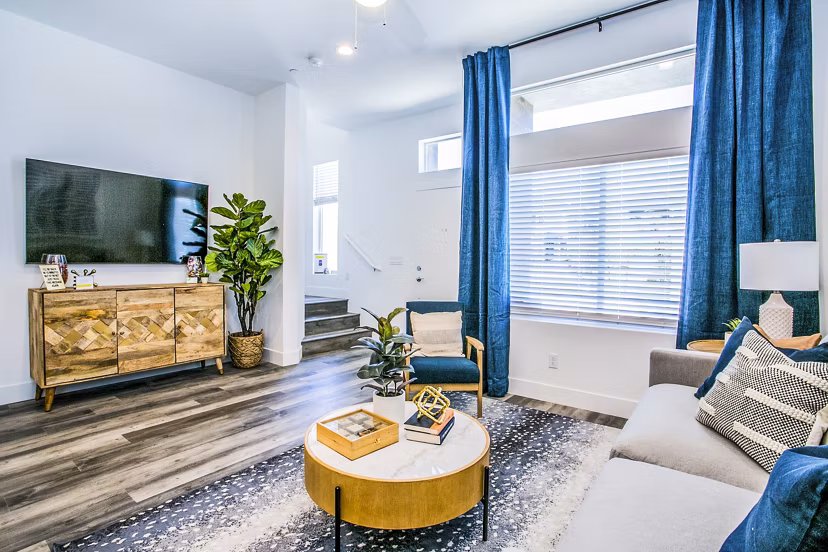 Spacious living room with modern furnishings at Townes at Peace Way Apartments, Greystar luxury apartments in Las Vegas