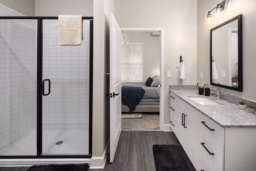 Bathroom with modern fixtures and spacious layout in The Crossings Apartments, luxury apartments offered by Greystar