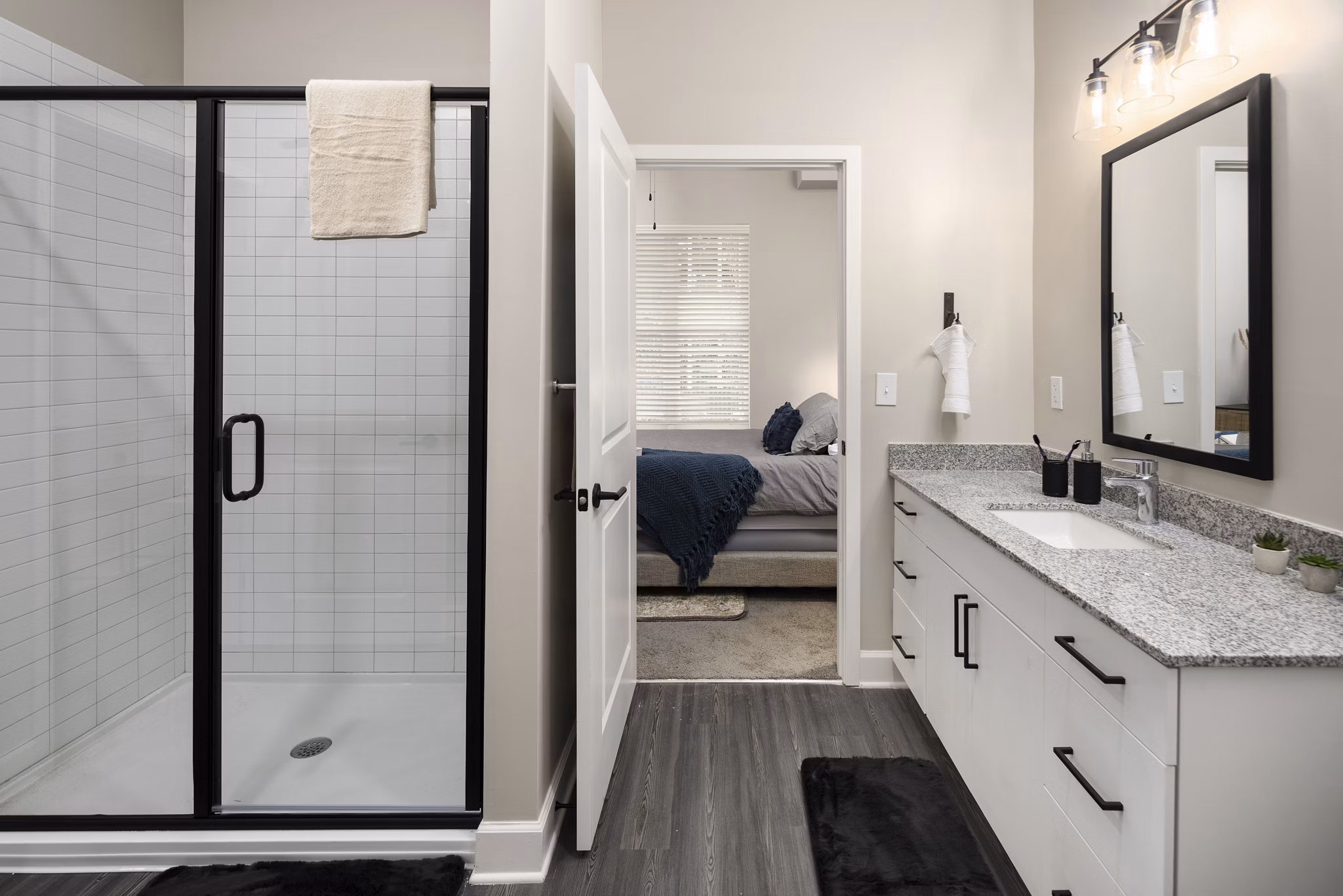 Bathroom with modern fixtures and spacious layout in The Crossings Apartments, luxury apartments offered by Greystar