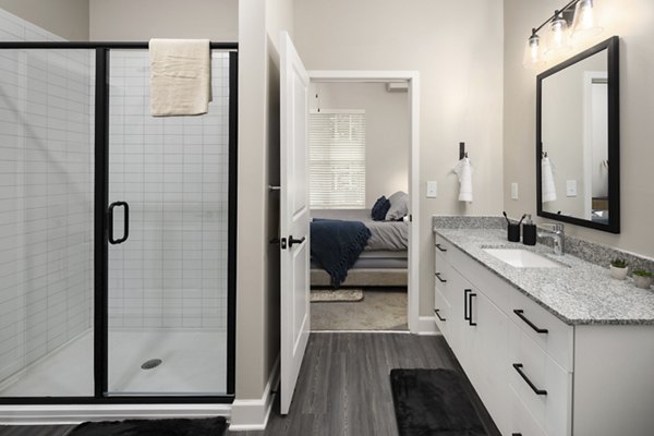 Bathroom with modern fixtures and spacious layout in The Crossings Apartments, luxury apartments offered by Greystar