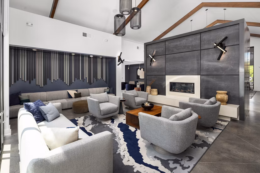 Business center with modern workstations at The Crossings Apartments, a luxury property