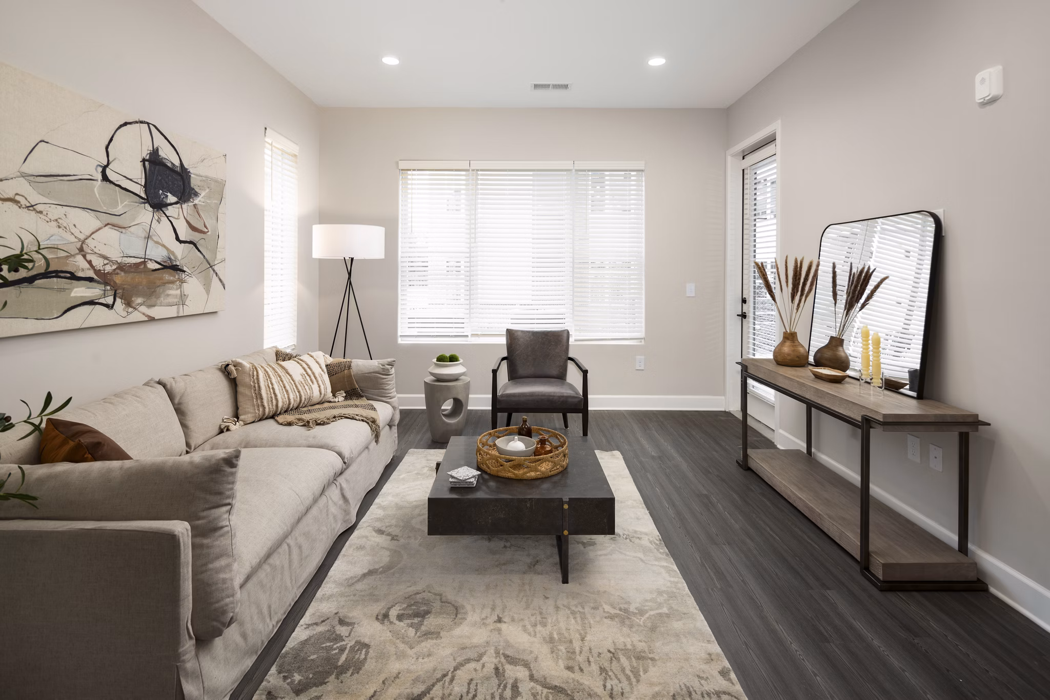 Spacious living room with stylish decor in The Crossings Apartments