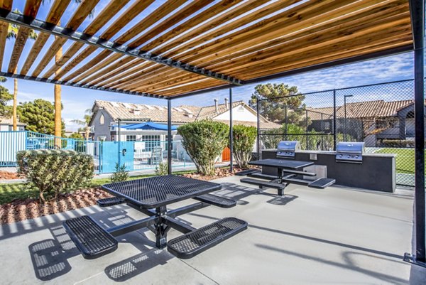 grill area/patio at  Escena Apartments