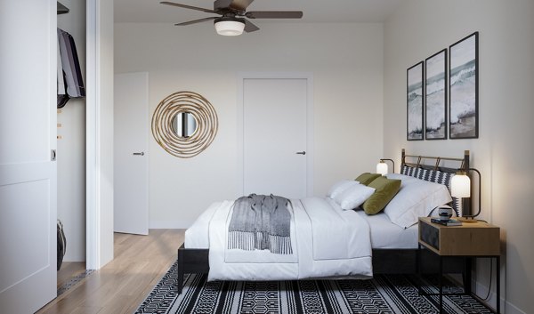 Comfortable bedroom with ample natural light in Kaulana Mahina Apartments