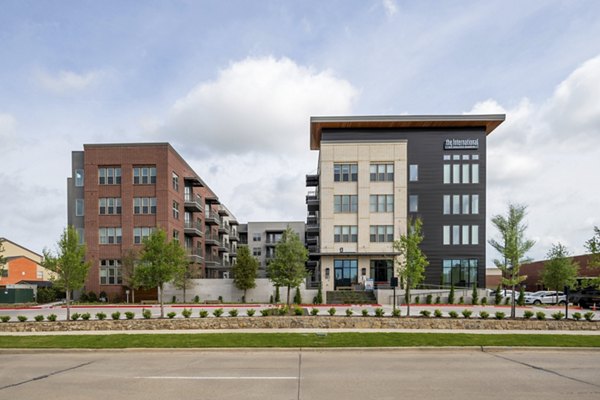 The International at Valley Ranch: Elegant facade of luxury apartments in prime market